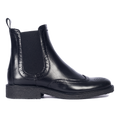 Boot with decorative brogue perforations