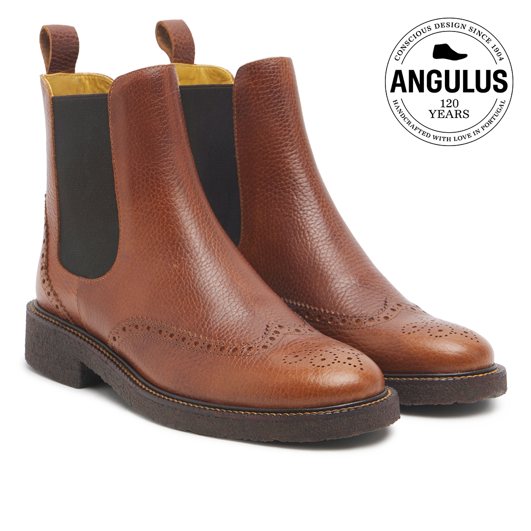 Boot with decorative brogue perforations