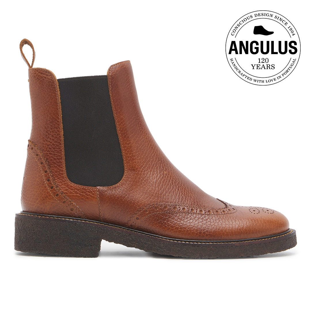 Boot with decorative brogue perforations