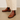 Boot with decorative brogue perforations