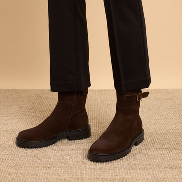 Boot with decorative buckle detail