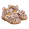 Angulus Starter sandal with a bow and velcro closure