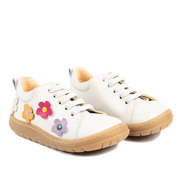 Sneaker with floral applications